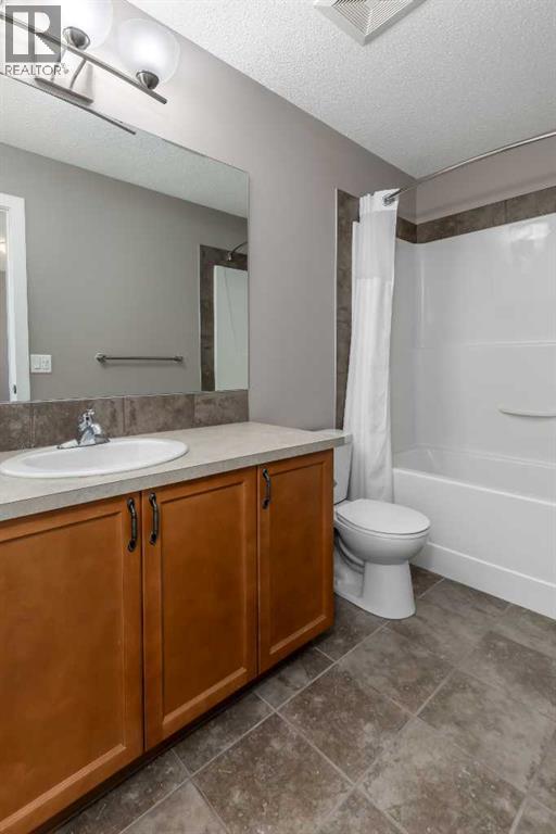 144 CLYDESDALE Way, Cochrane — photo 19
