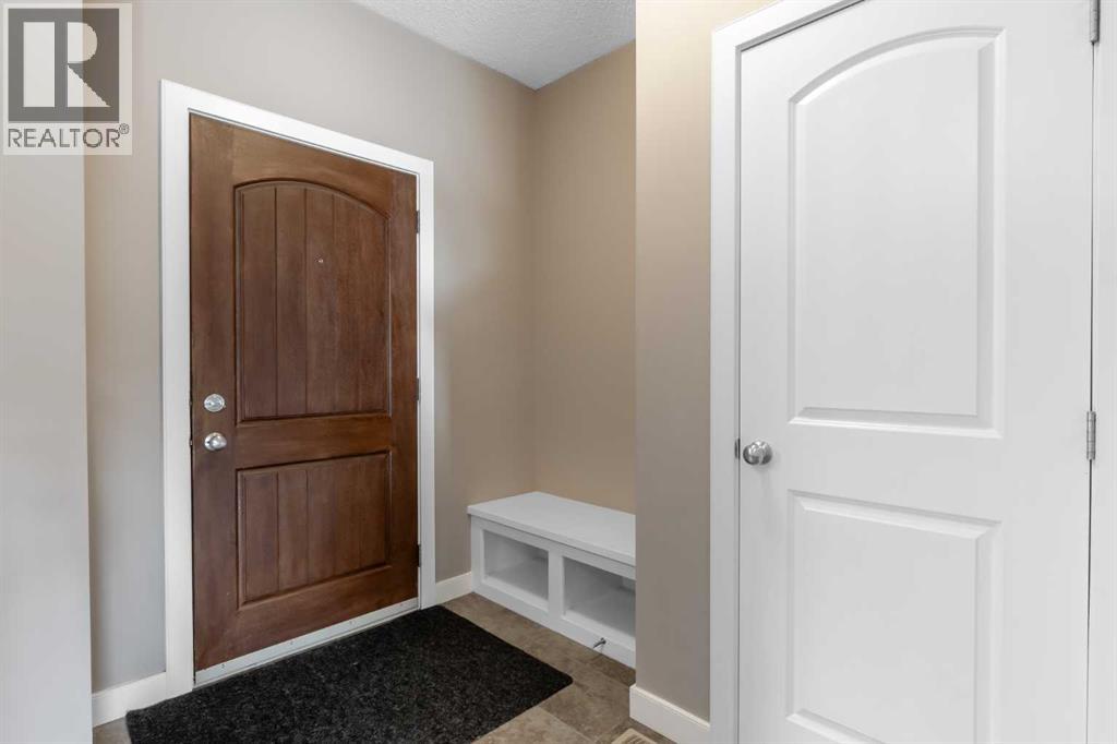 144 CLYDESDALE Way, Cochrane — photo 2