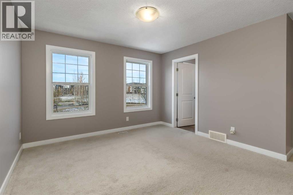 144 CLYDESDALE Way, Cochrane — photo 25