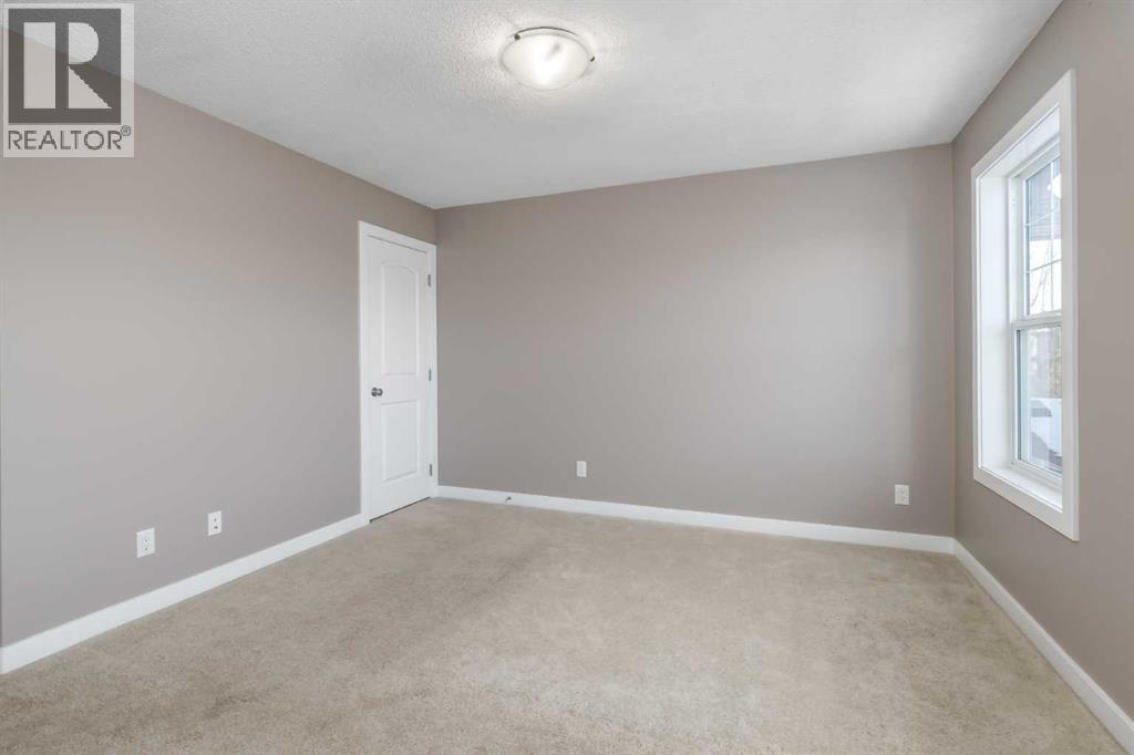 144 CLYDESDALE Way, Cochrane — photo 27