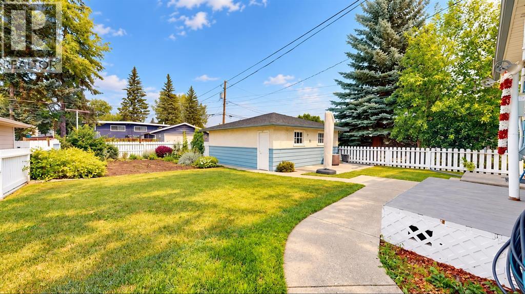 712 55 Avenue SW, Calgary — photo 17