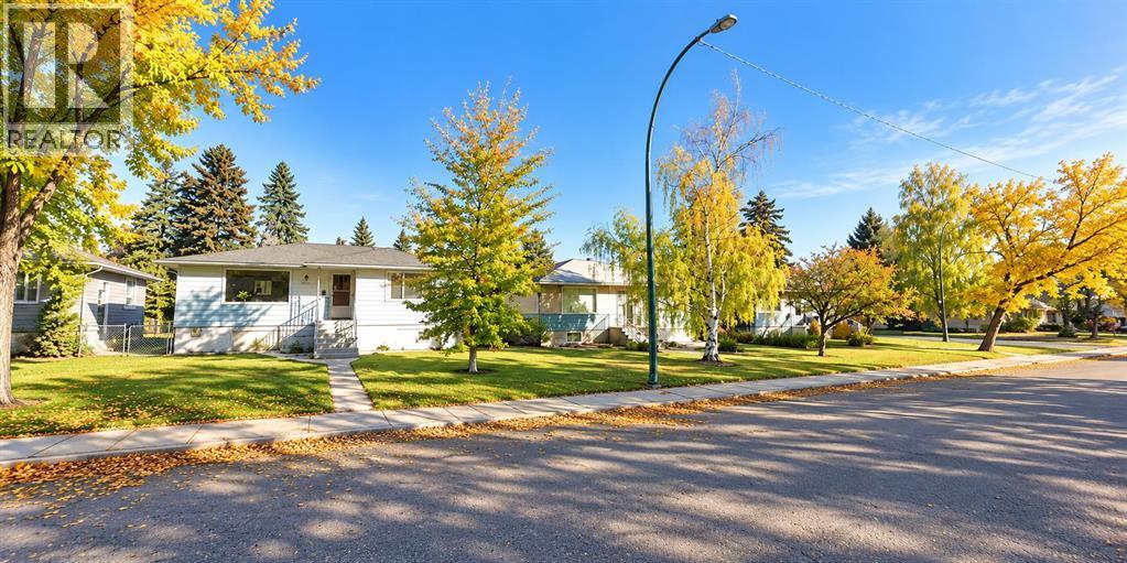 712 55 Avenue SW, Calgary — photo 2