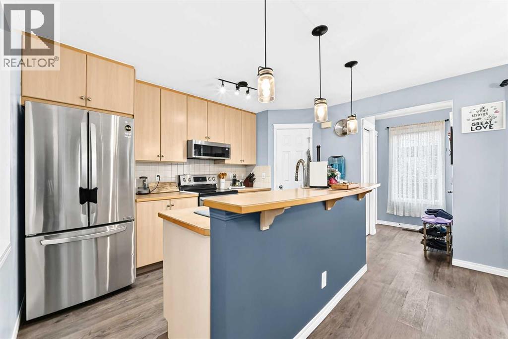 1037 New Brighton Gardens SE, Calgary — photo 4