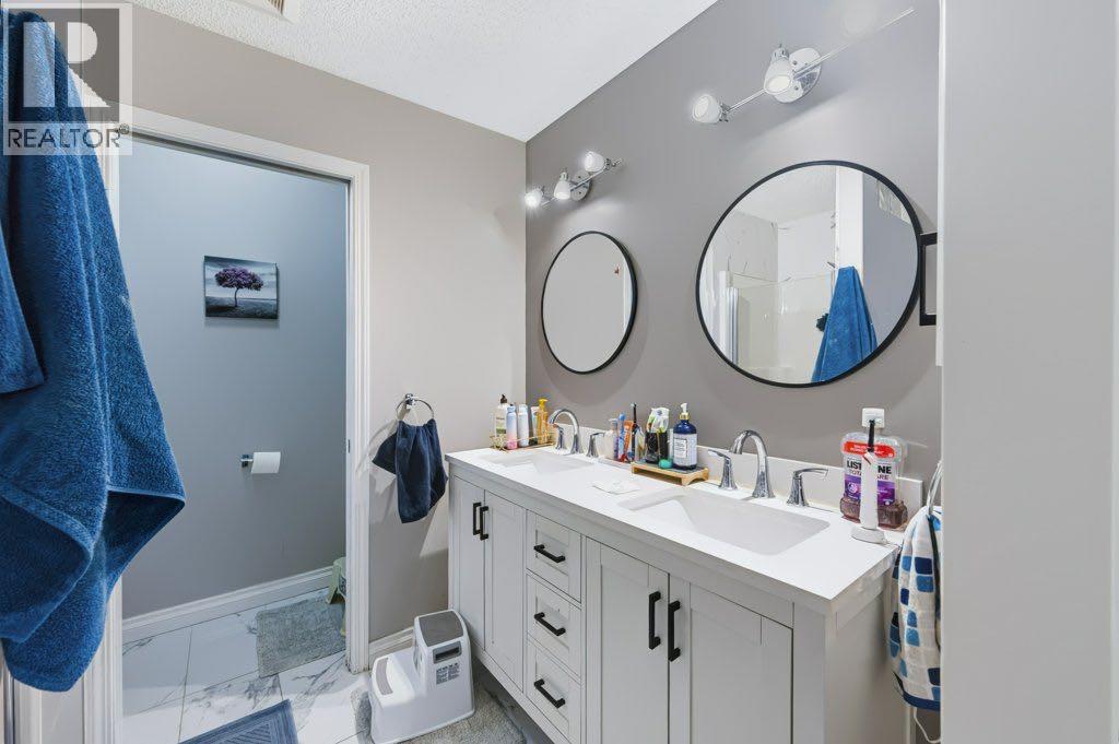 71 Cougarstone Court SW, Calgary — photo 19