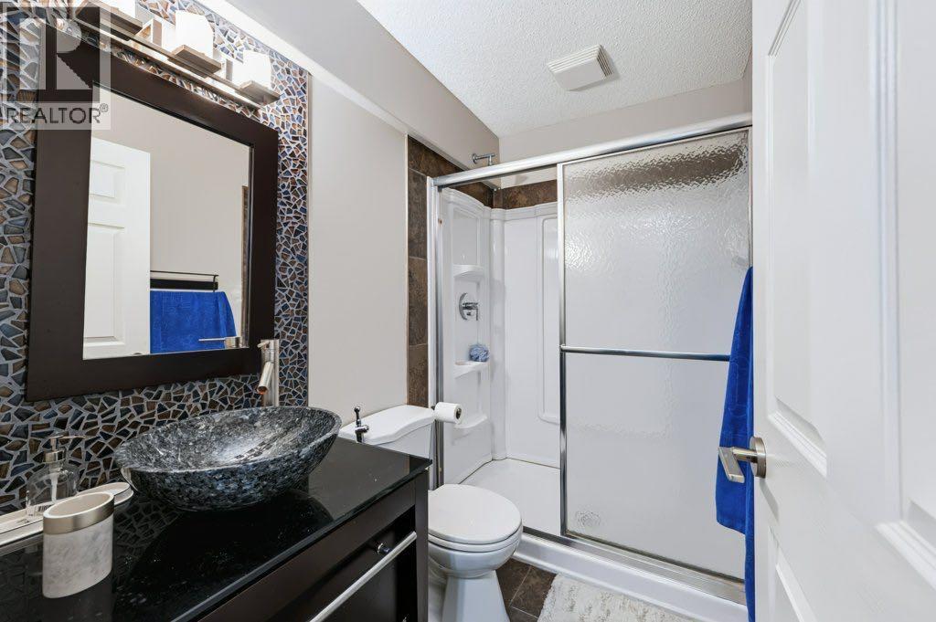 71 Cougarstone Court SW, Calgary — photo 31