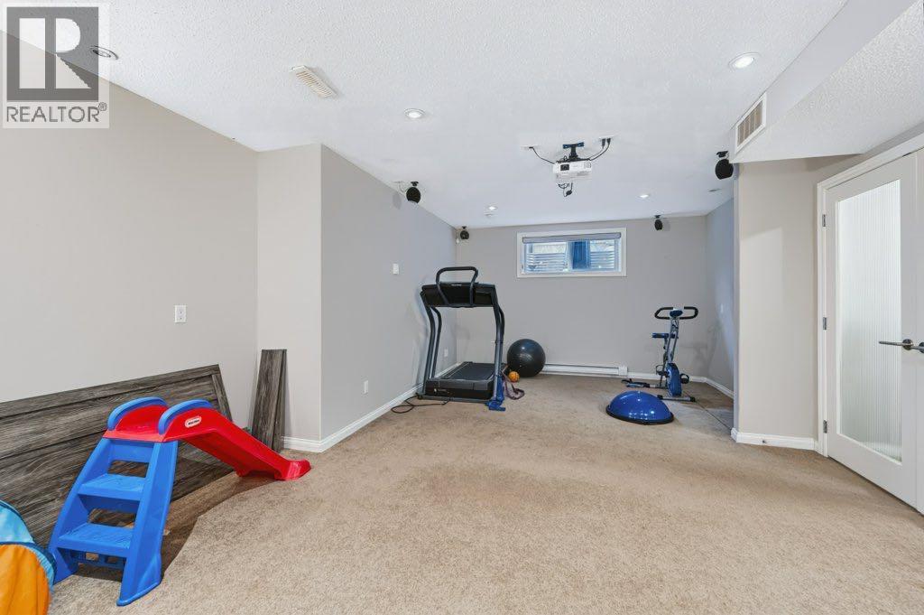 71 Cougarstone Court SW, Calgary — photo 35