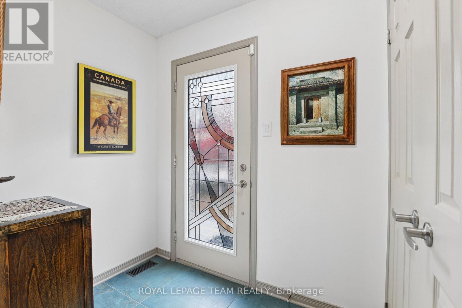 SPACIOUS FRONT HALL.  DOUBLE CLOSET.