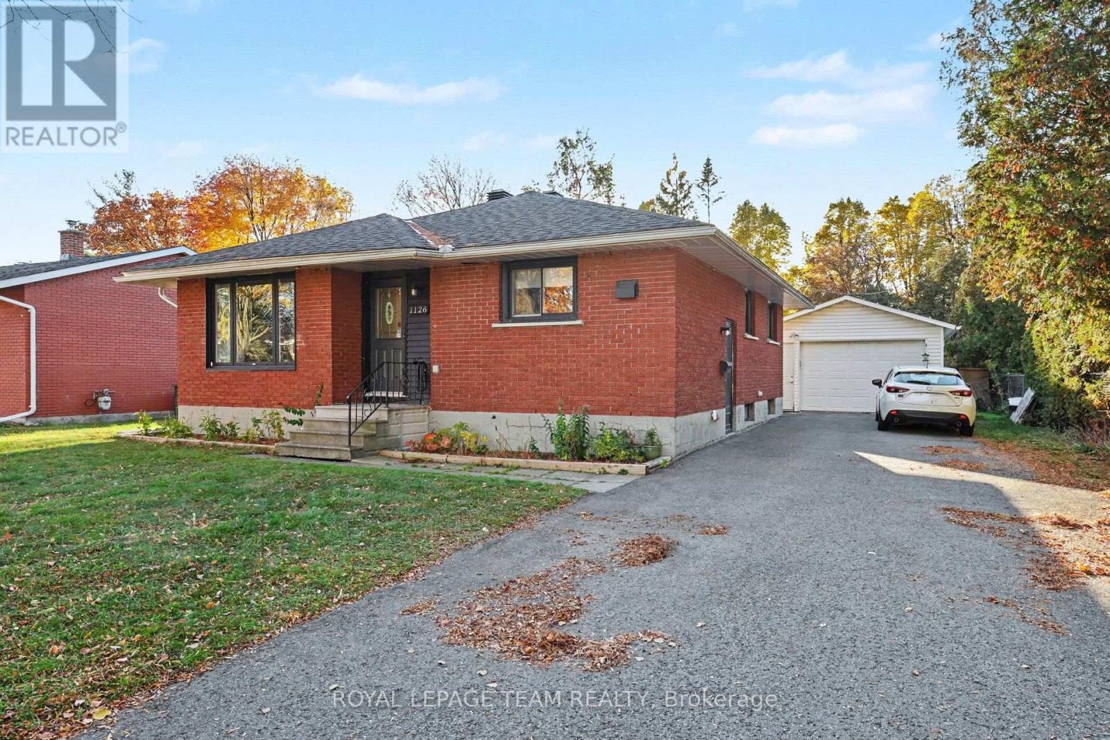 Long double driveway and detached garage