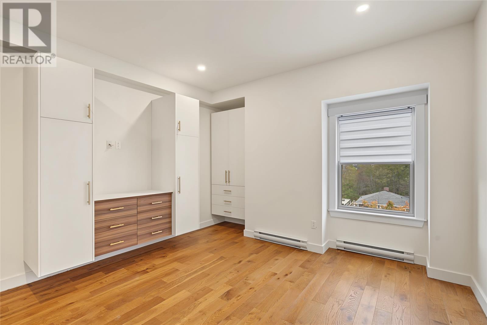 181 HAMILTON Avenue Unit#404 ST. JOHN'S Newfoundland & Labrador Canada A1E1J4, for Sale, residential, Haris Barki, Keller Williams Platinum Realty