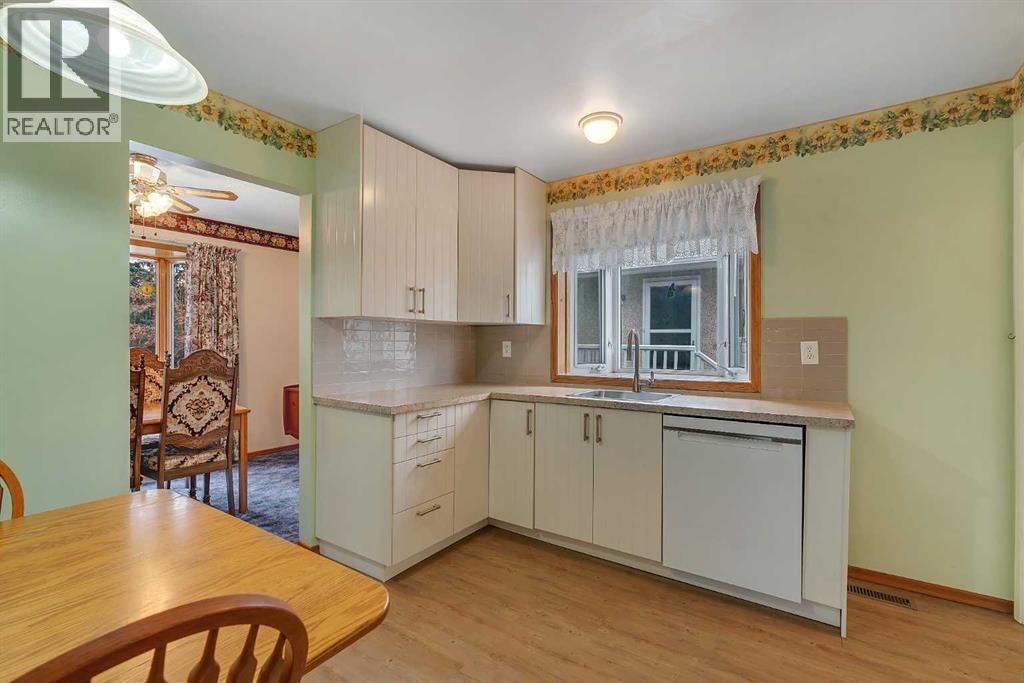 4 Bed, 2 Bath House for Sale in Calgary – 7383 Huntley Road NE, Calgary – MLS# A2355637 - Image 8