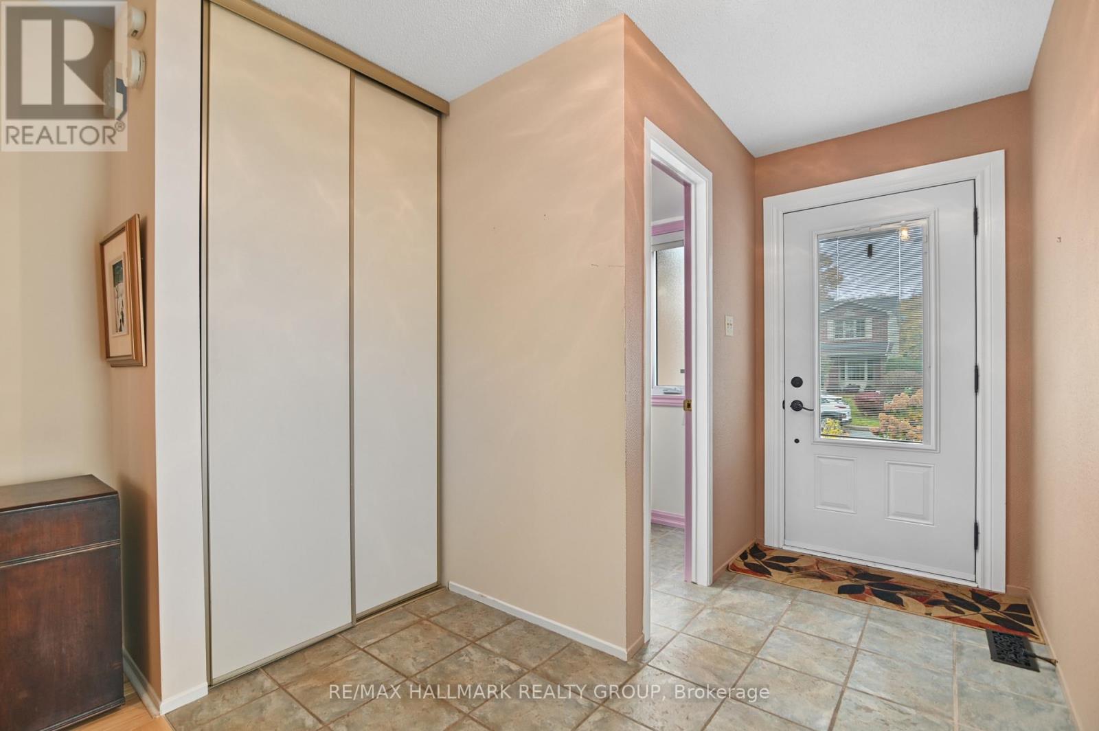 ENTRANCE | retractable screen door, powder room