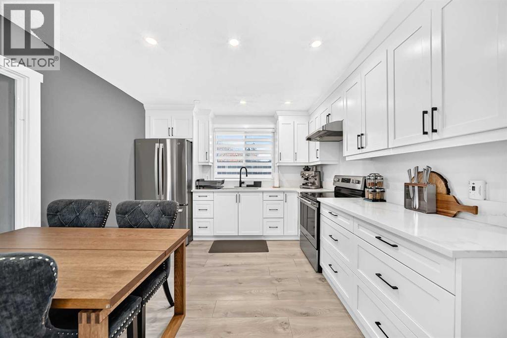 6020 18 Avenue NE, photo 9 of 32