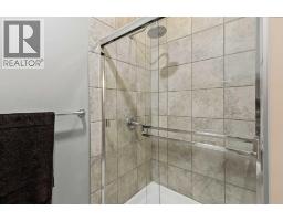 153 Coopers Park SW, Airdrie — photo 23