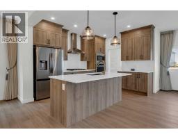 541 Baywater Manor SW, Airdrie — photo 2