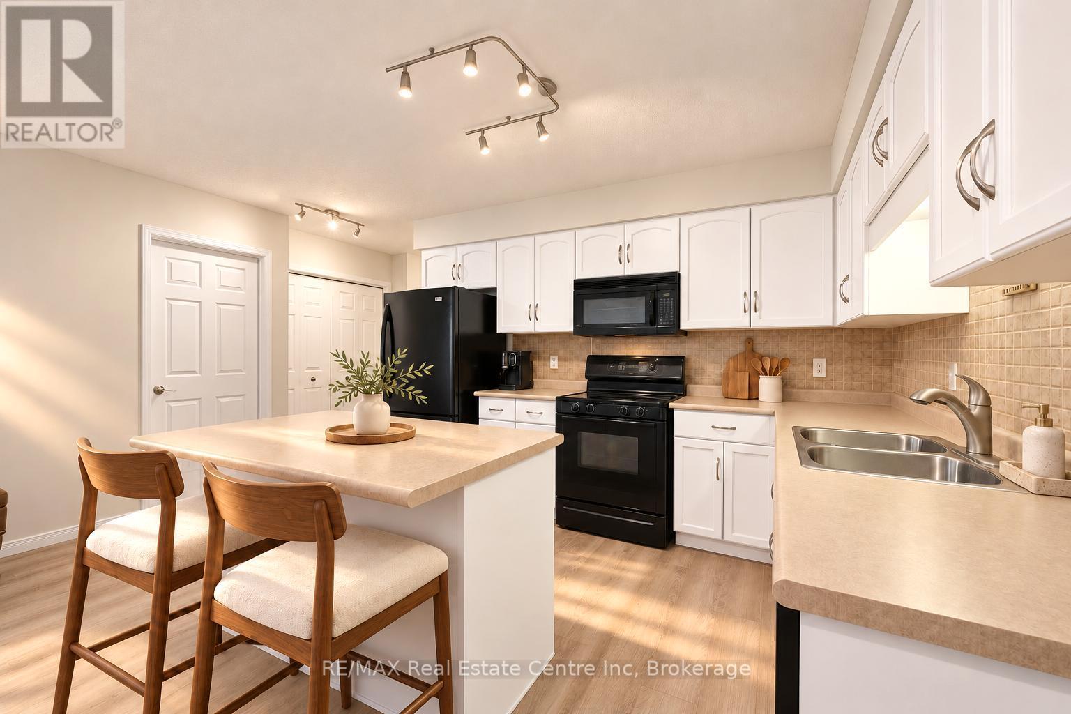 38 - 210 DAWN AVENUE, Guelph (Clairfields/Hanlon Business Park) — photo 2