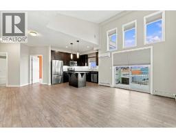 420, 402 Marquis Lane SE, Calgary — photo 3