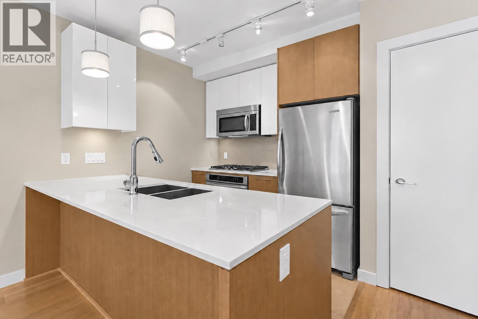 #610-6951 ELMBRIDGE Way, Richmond