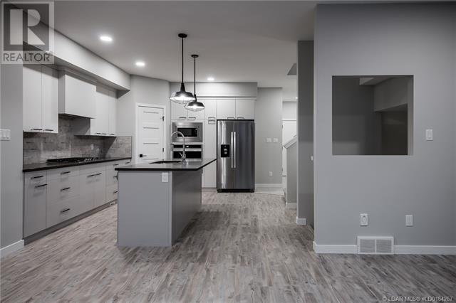 902 Pacific Way W, Lethbridge House For Sale