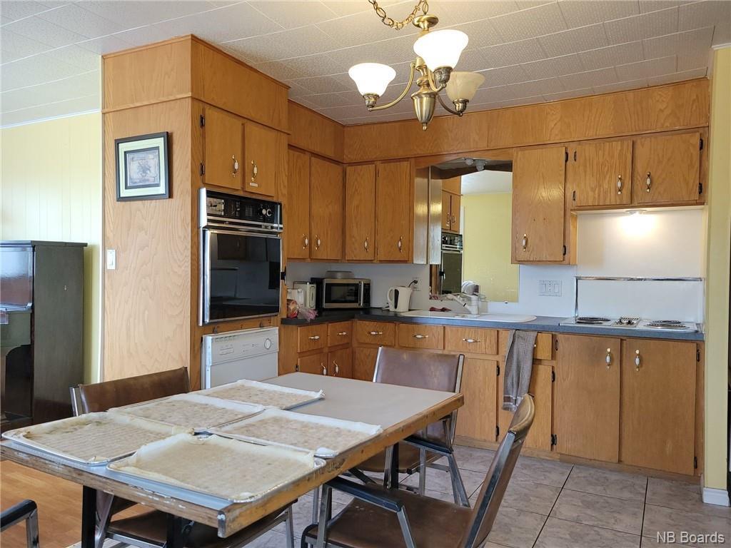 251 Rue Canada, Saint-Quentin, New Brunswick  E8A 1K2 - Photo 38 - NB073452