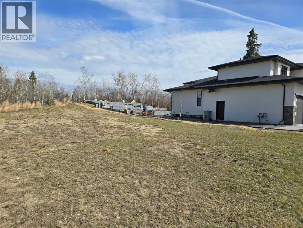 125 Wolf Run Drive, Rural Ponoka County, Alberta  T4J 1R3 - Photo 5 - A1193584
