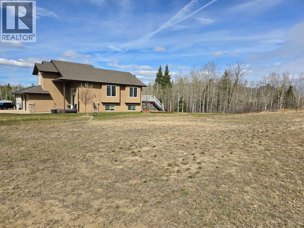 125 Wolf Run Drive, Rural Ponoka County, Alberta  T4J 1R3 - Photo 6 - A1193584