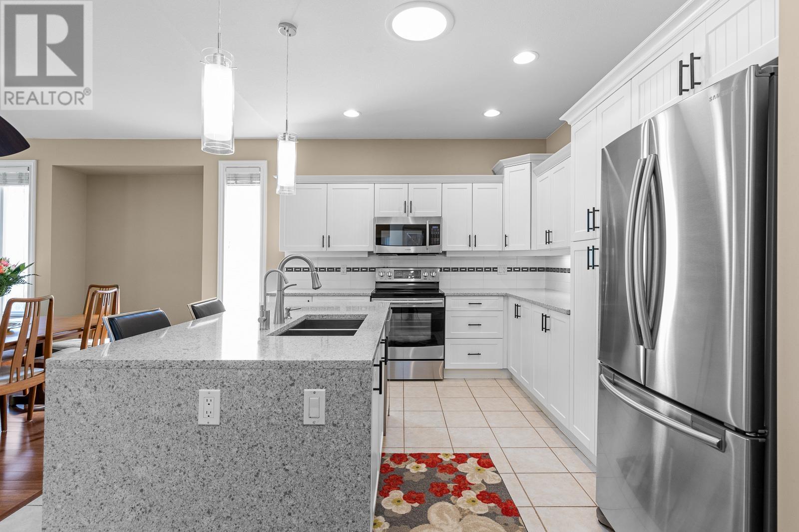 127 19639 Meadow Gardens Way, Pitt Meadows, British Columbia  V3Y 2T5 - Photo 5 - R2792142