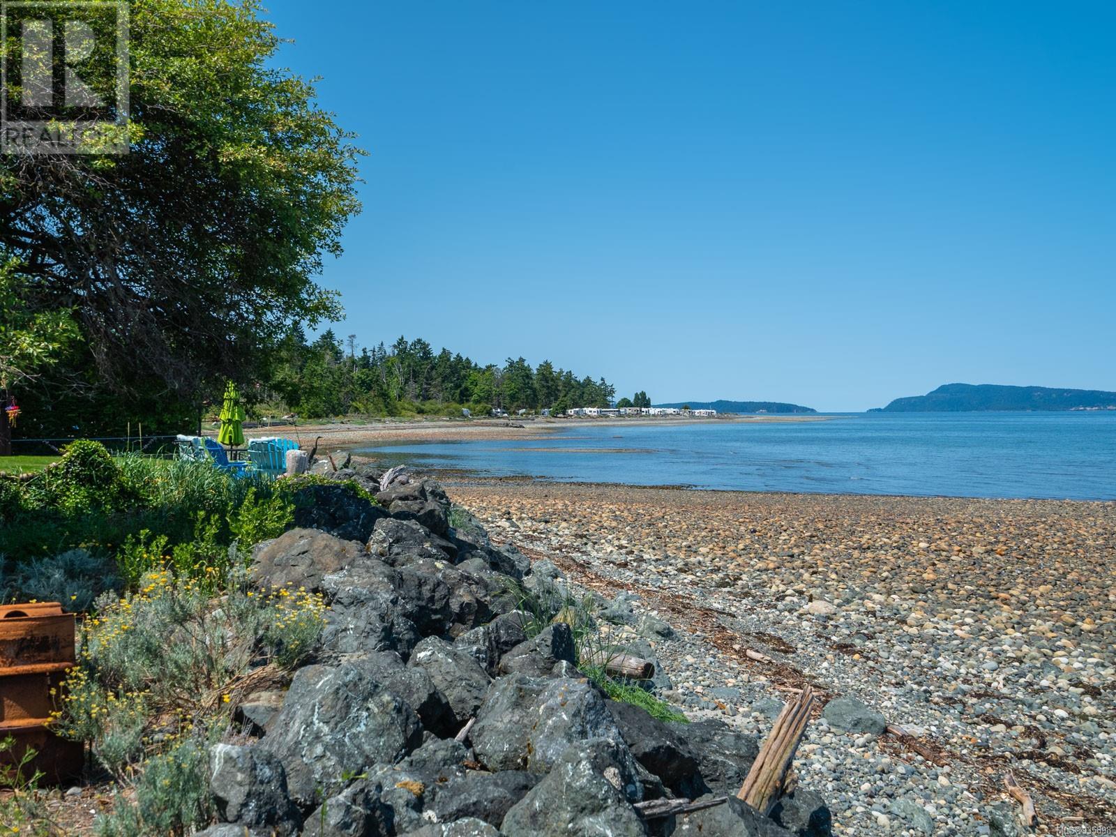 5533 Island Hwy W, Qualicum Beach, British Columbia  V9K 2C8 - Photo 1 - 935898