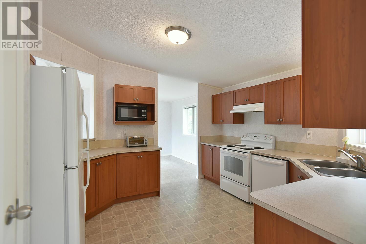7735 Redrooffs Road, Halfmoon Bay, British Columbia  V7Z 1A1 - Photo 8 - R2798037