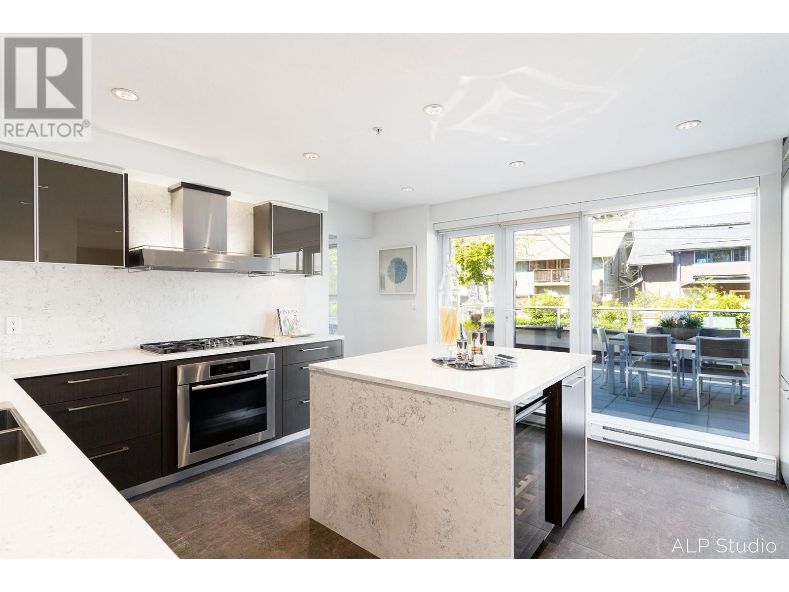 215&216 1961 Collingwood Street, Vancouver, British Columbia  V6R 3K6 - Photo 1 - R2810201