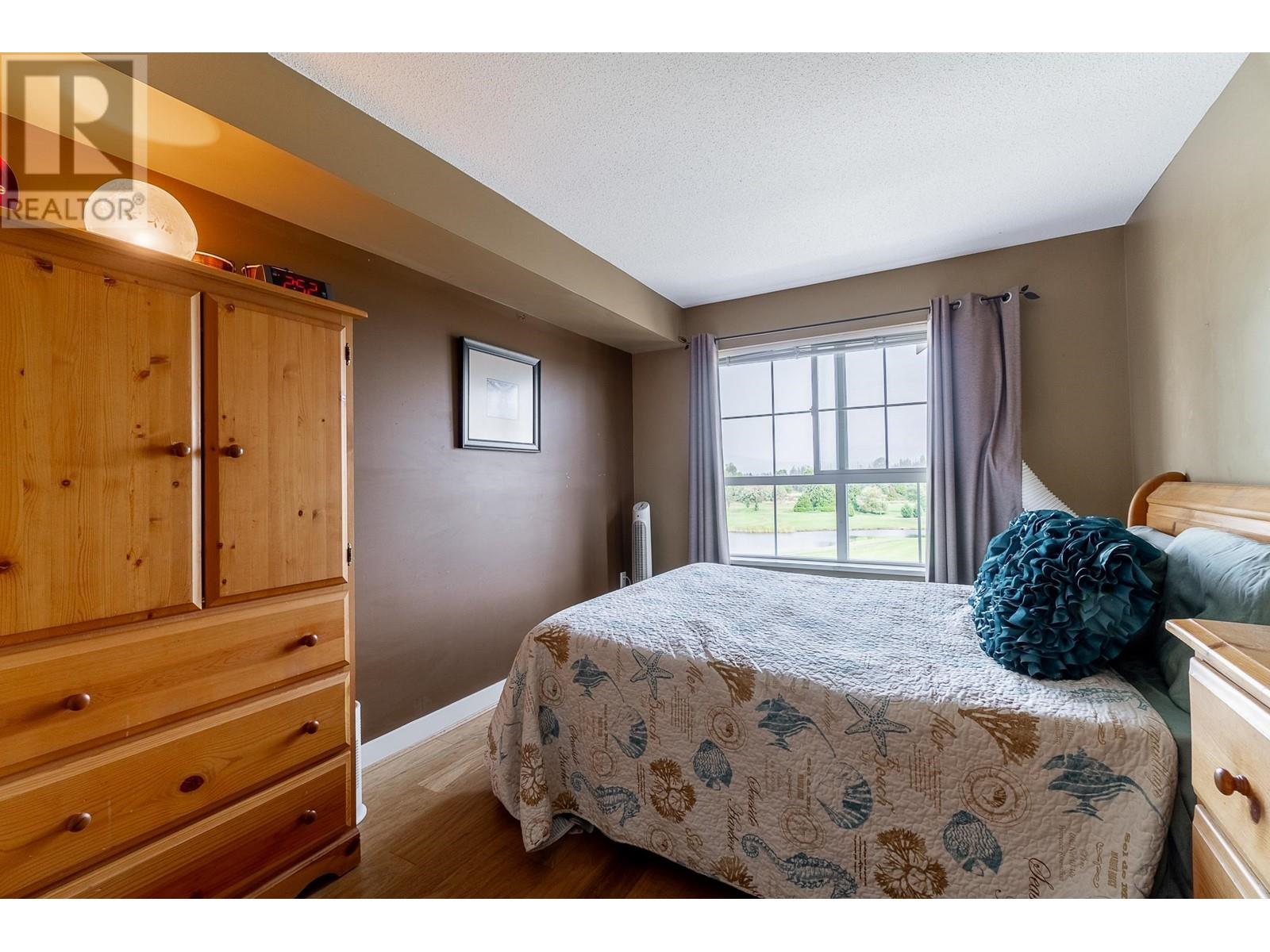 404 19677 Meadow Gardens Way, Pitt Meadows, British Columbia  V3Y 0A2 - Photo 28 - R2809617