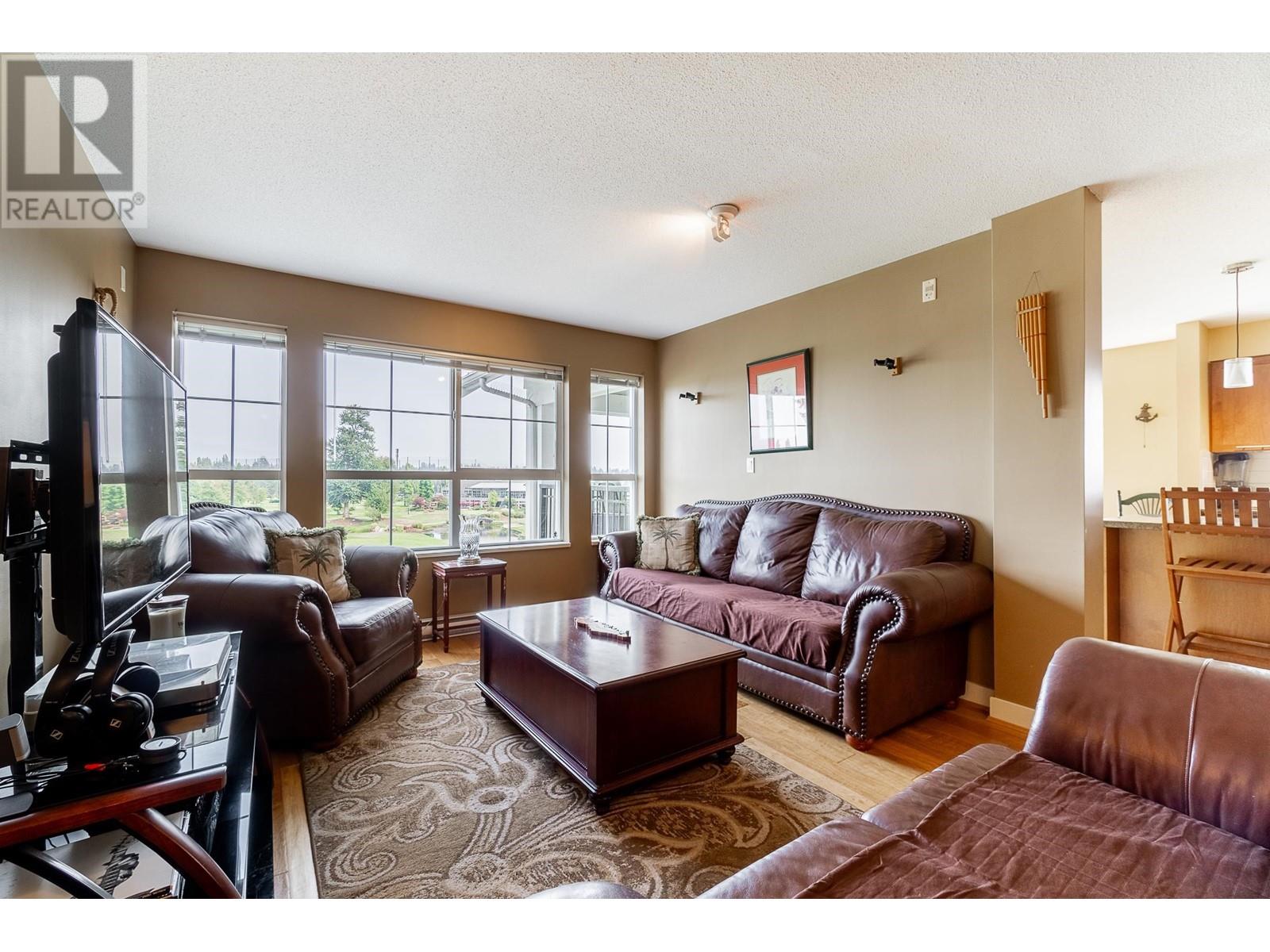 404 19677 Meadow Gardens Way, Pitt Meadows, British Columbia  V3Y 0A2 - Photo 19 - R2809617