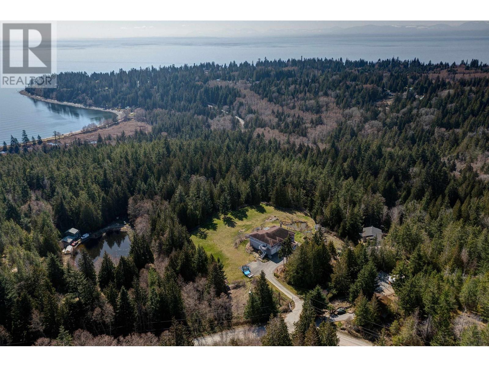 7967 Ravens Cry Road, Halfmoon Bay, British Columbia  V7Z 1C2 - Photo 10 - R2814751