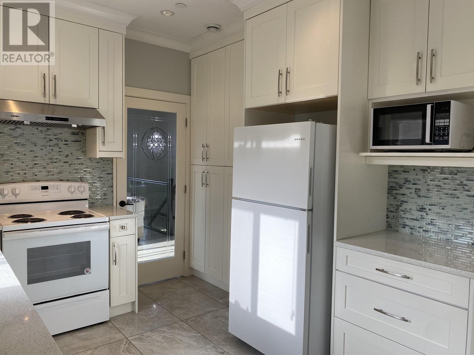 Main 717 East 61st Avenue, Vancouver, British Columbia  V5X 2C1 - Photo 6 - R2821283