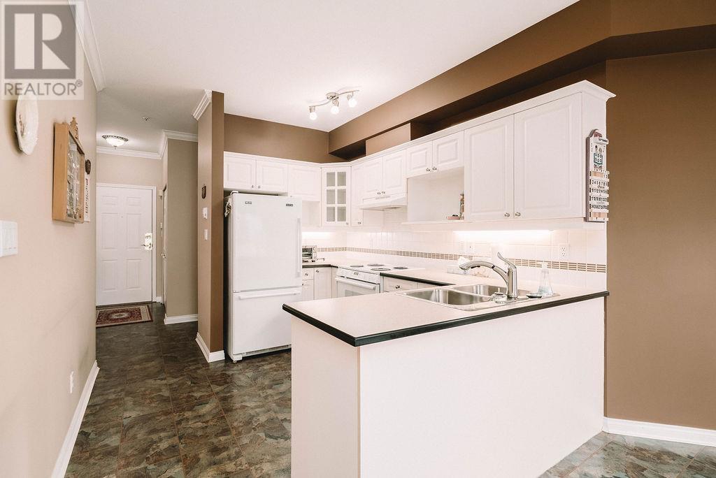 316 3098 Guildford Way, Coquitlam, British Columbia  V3B 7W8 - Photo 4 - R2823249