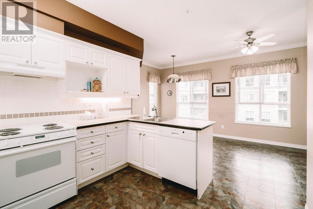 316 3098 Guildford Way, Coquitlam, British Columbia  V3B 7W8 - Photo 1 - R2823249