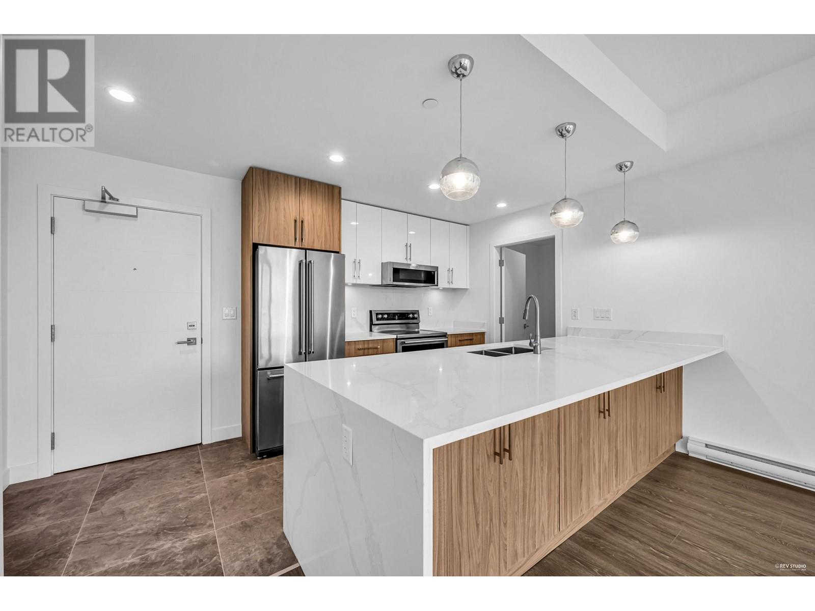 401 11703 Fraser Street, Maple Ridge, British Columbia  V2X 9A7 - Photo 3 - R2823579