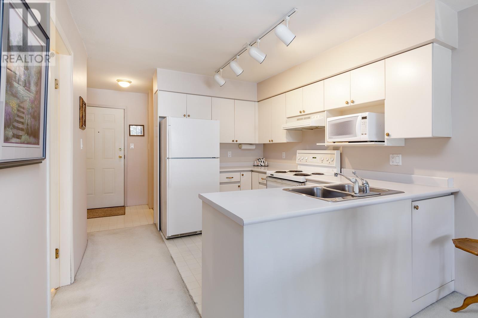 208 1966 Coquitlam Avenue, Port Coquitlam, British Columbia  V3B 7P8 - Photo 9 - R2824861