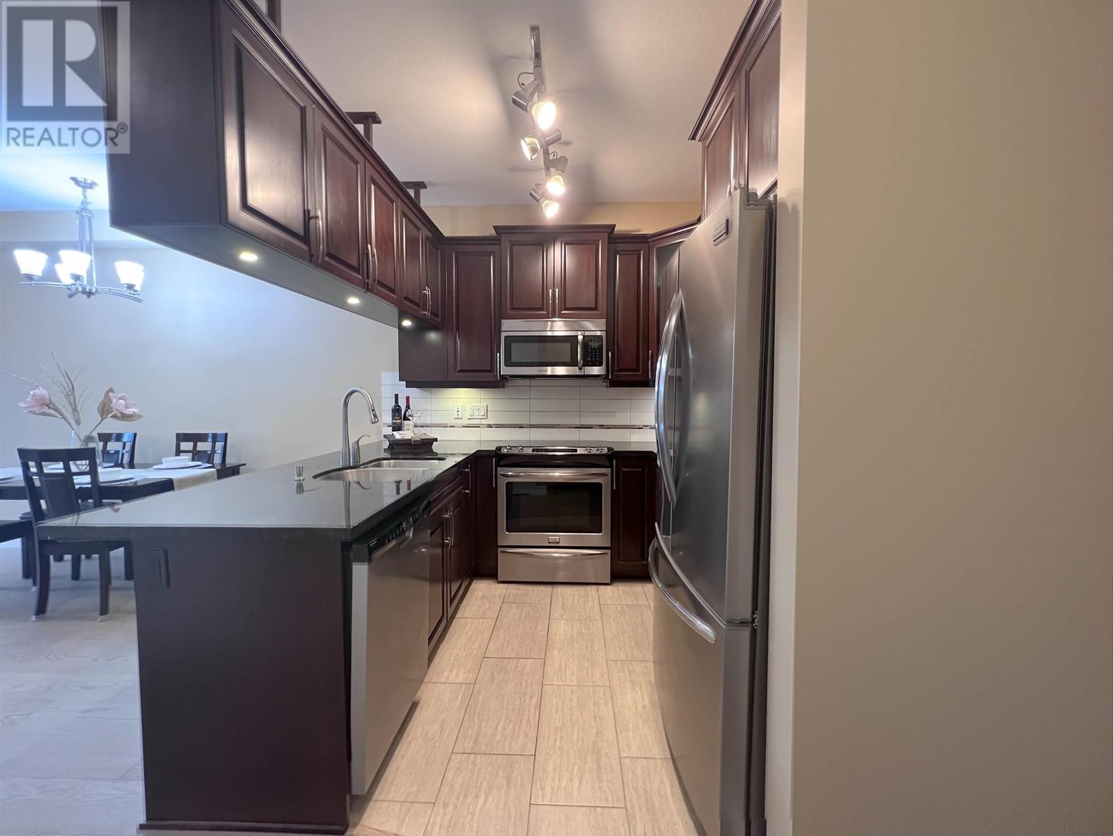 107 12655 190a Street, Pitt Meadows, British Columbia  V3Y 0E9 - Photo 2 - R2825461