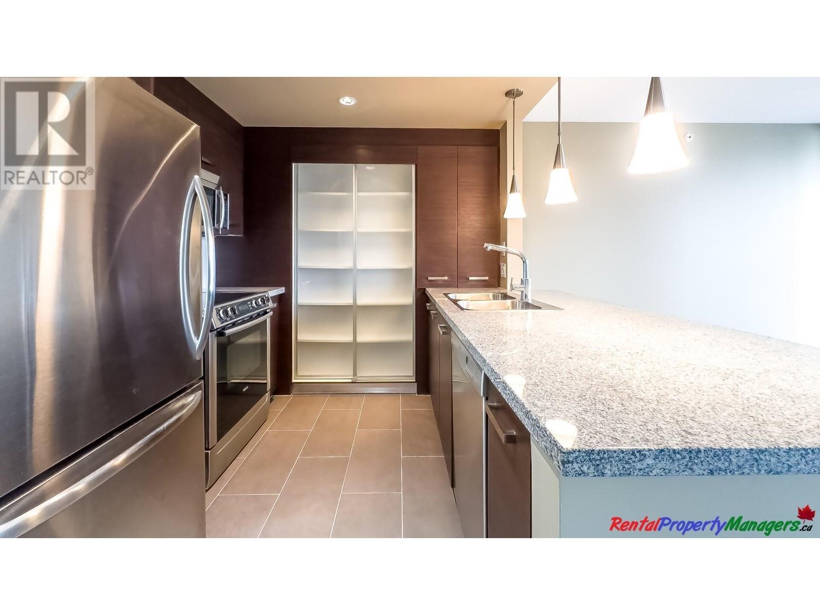 1505 2959 Glen Drive, Coquitlam, British Columbia  V3B 0B8 - Photo 10 - R2825535