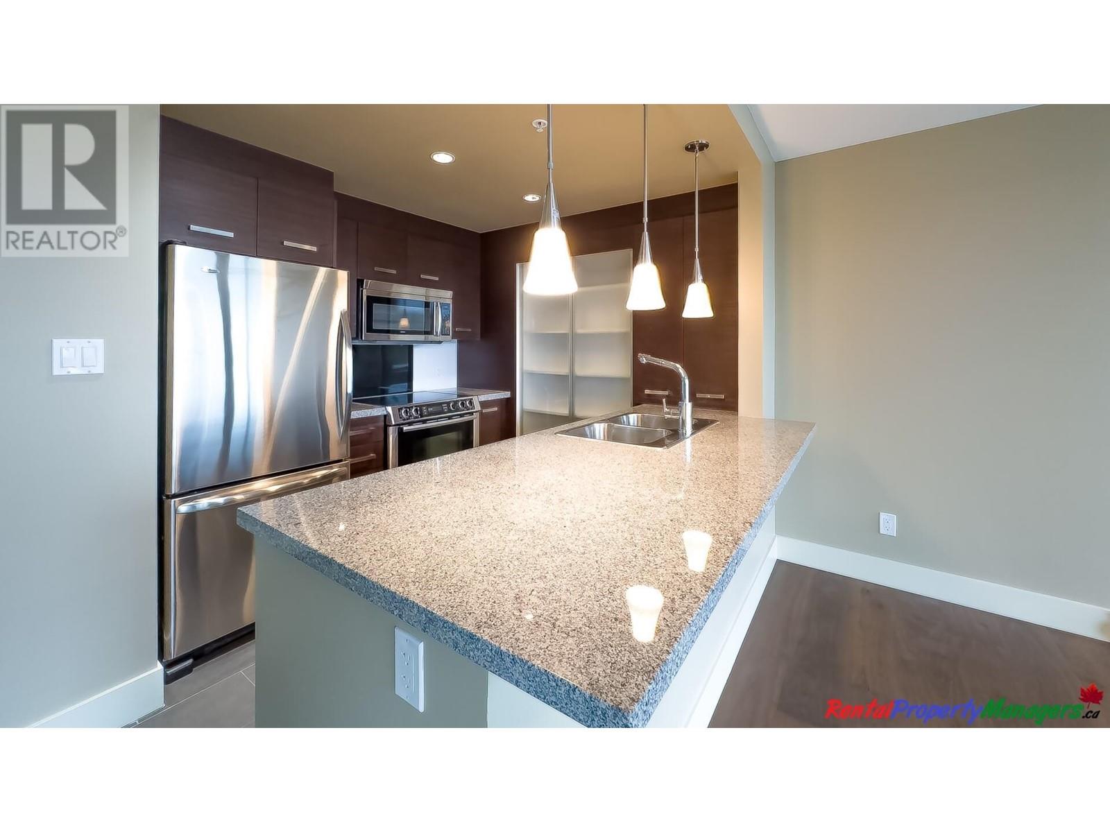 1505 2959 Glen Drive, Coquitlam, British Columbia  V3B 0B8 - Photo 9 - R2825535