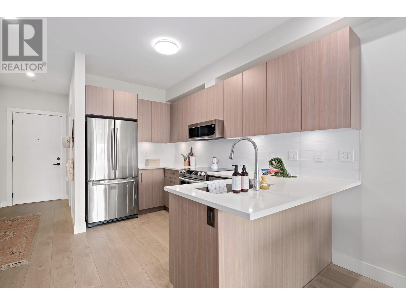 206 1633 Tatlow Avenue, North Vancouver, British Columbia  V7P 2Z8 - Photo 4 - R2825767
