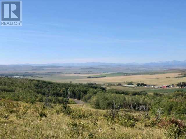 306 Avenue W, Rural Foothills County, Alberta  T2S 1A2 - Photo 3 - A2084312