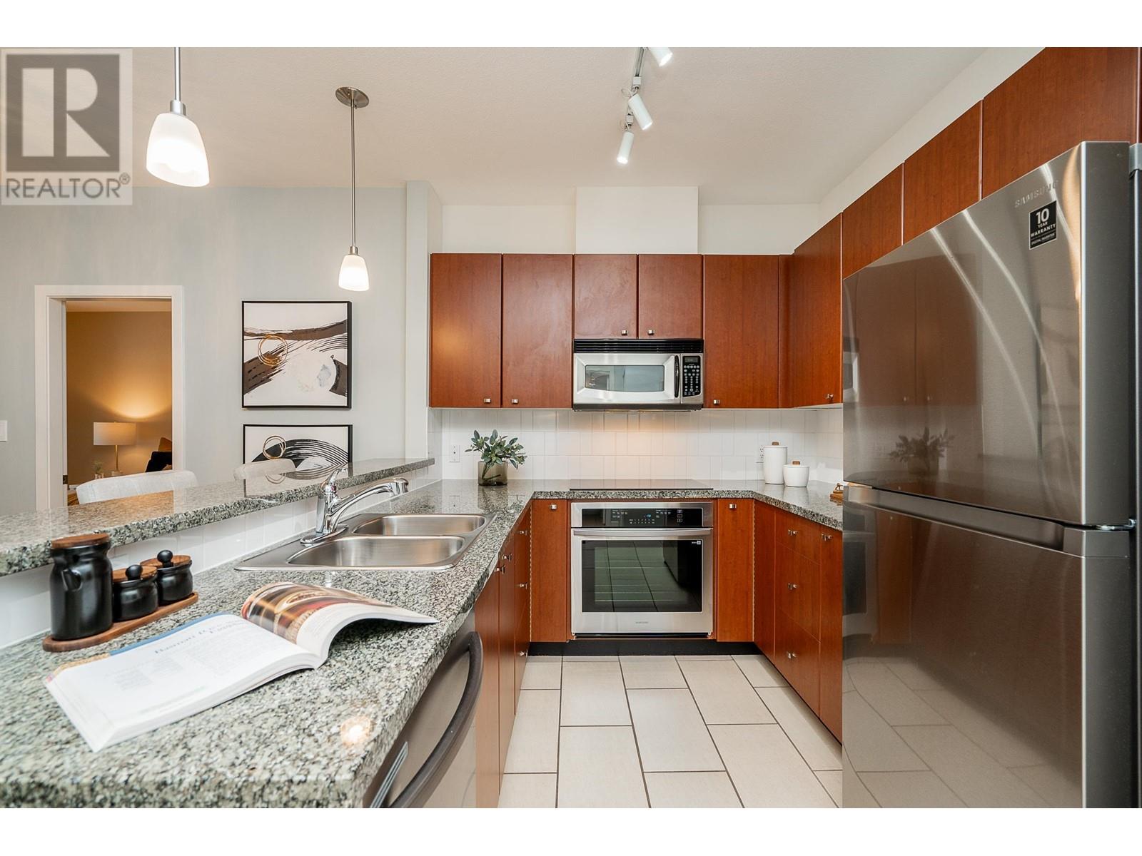 310 100 Capilano Road, Port Moody, British Columbia  V3H 5M9 - Photo 4 - R2827512