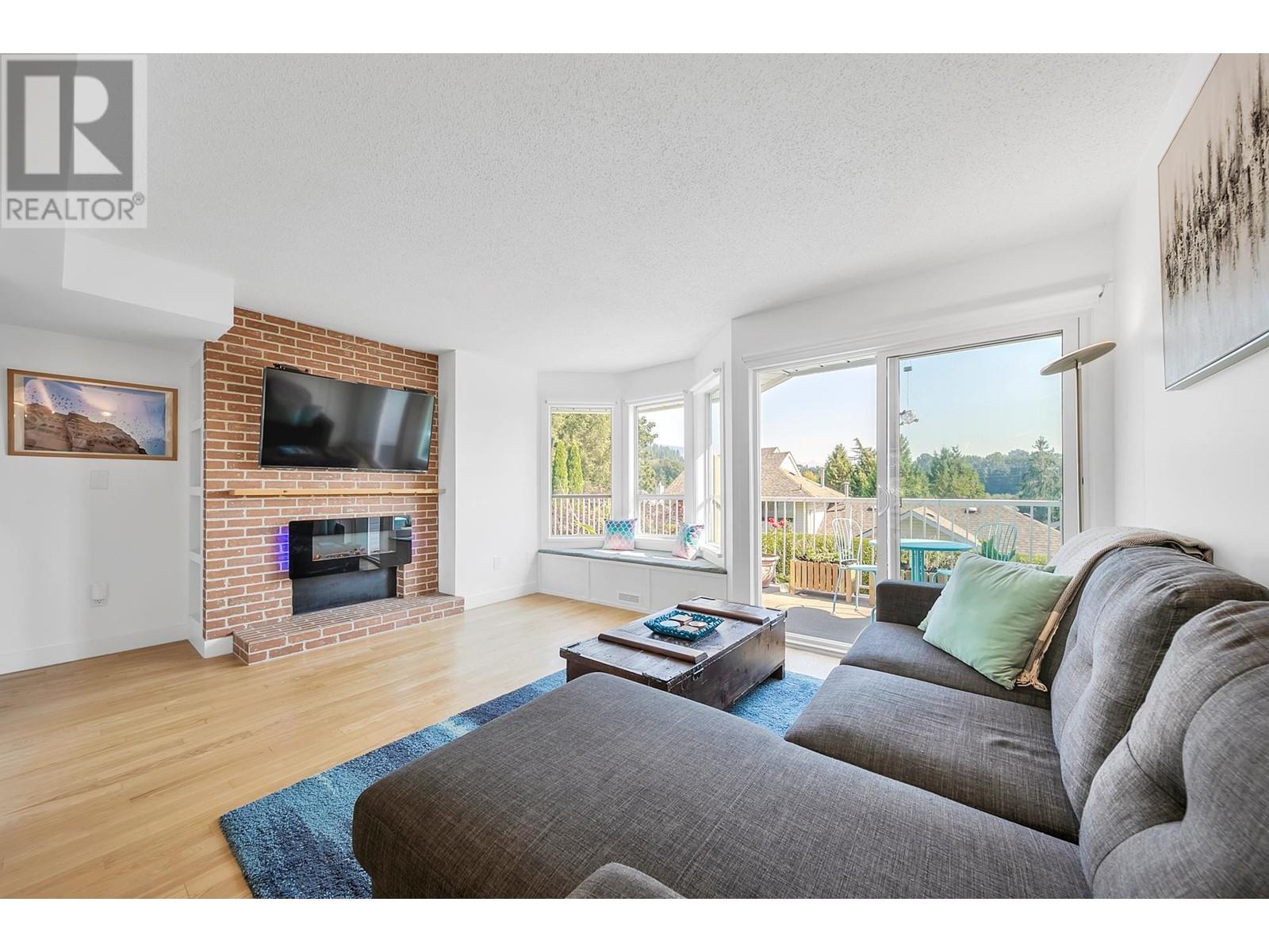 402 1176 Falcon Drive, Coquitlam, British Columbia  V3E 2N8 - Photo 2 - R2827735