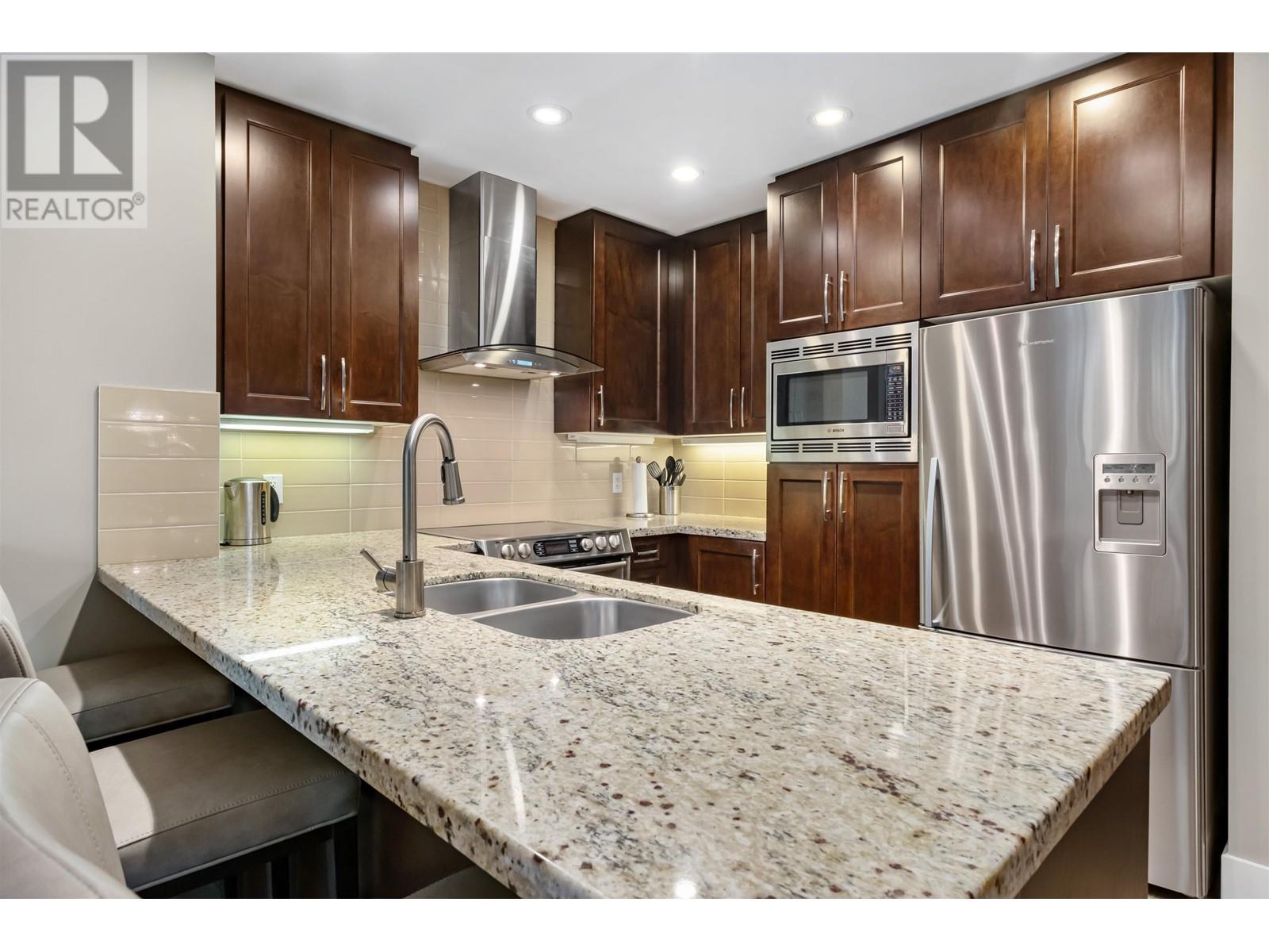 506 1415 Parkway Boulevard, Coquitlam, British Columbia  V3E 0C7 - Photo 2 - R2828407
