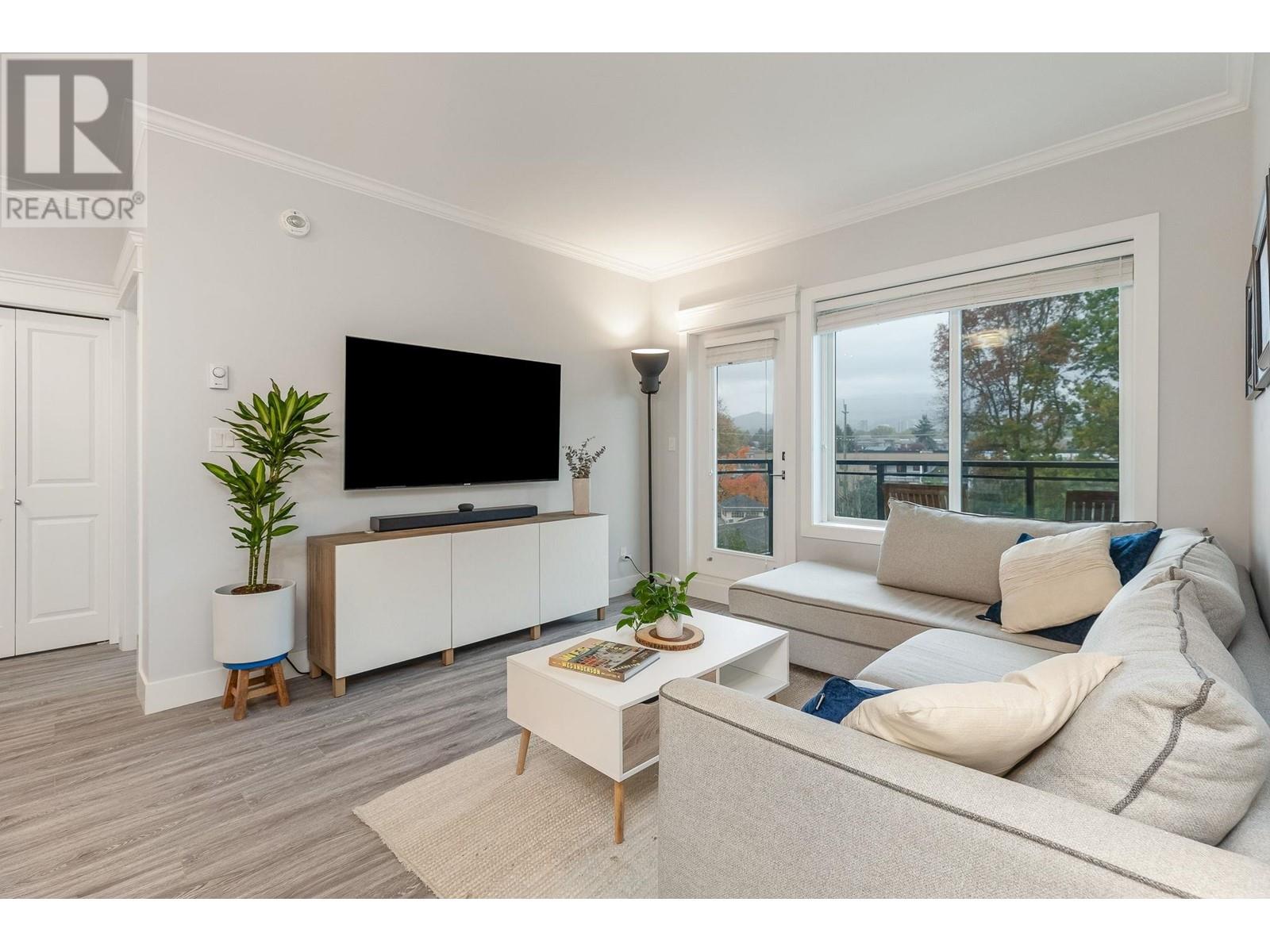 406 2229 Atkins Avenue, Port Coquitlam, British Columbia  V3C 0H2 - Photo 1 - R2828737