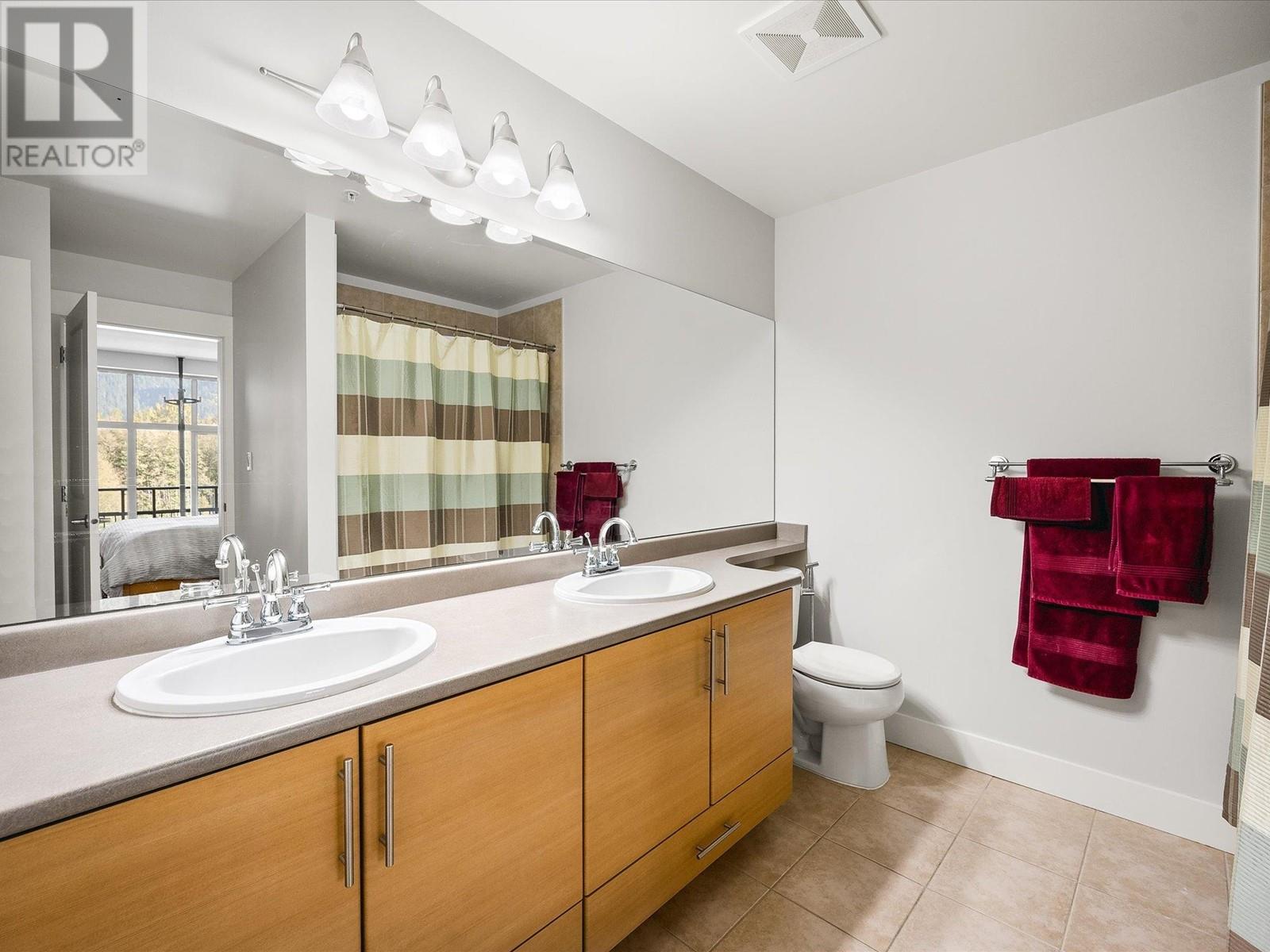 407 1211 Village Green Way, Squamish, British Columbia  V8B 0R7 - Photo 14 - R2830270