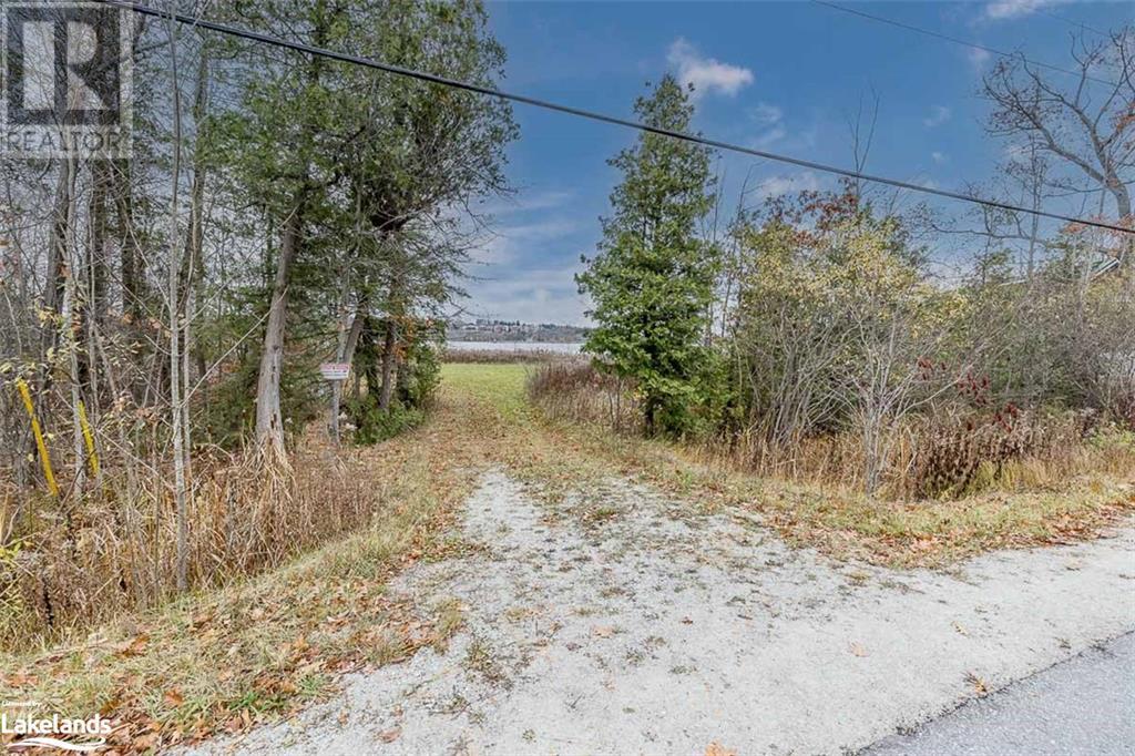 203 Peek A Boo Trail, Tiny, Ontario  L9M 0B7 - Photo 1 - 40509023