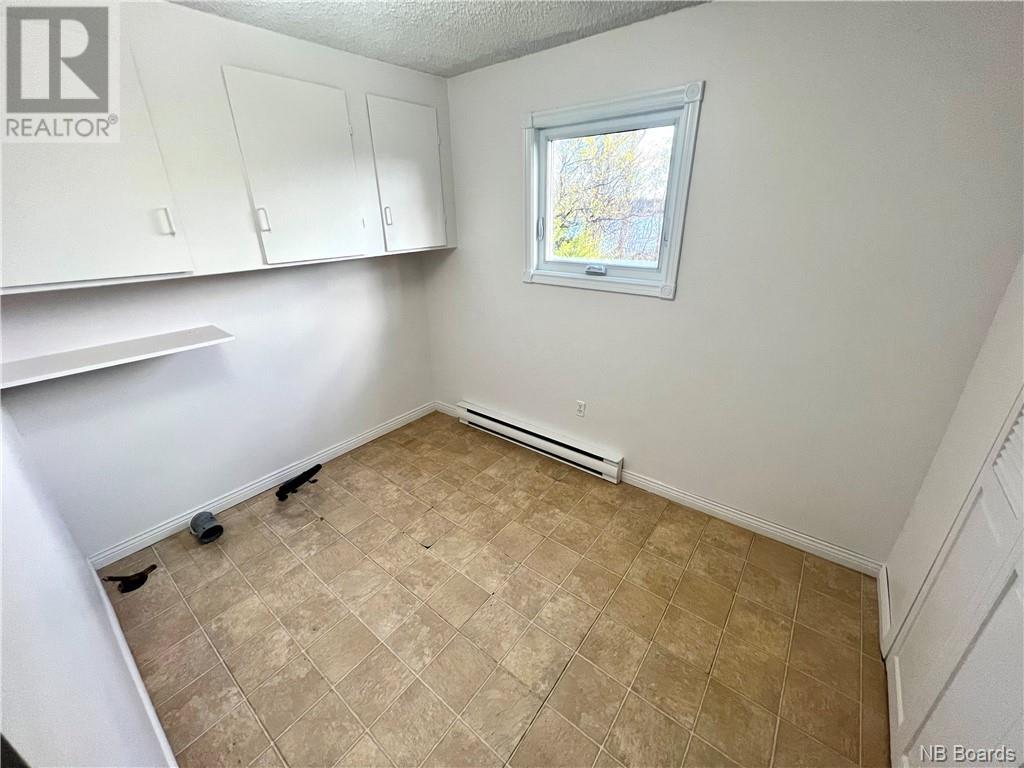 61 Rue Du Ruisseau, Lamèque, New Brunswick  E8T 1M2 - Photo 21 - NB093592
