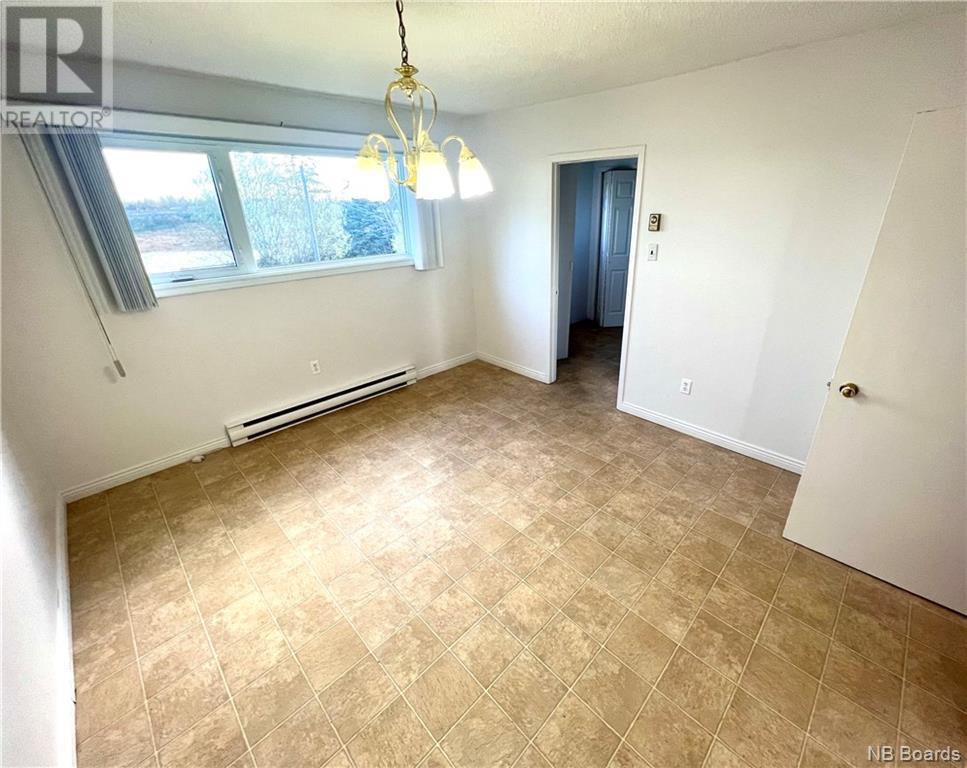 61 Rue Du Ruisseau, Lamèque, New Brunswick  E8T 1M2 - Photo 23 - NB093592